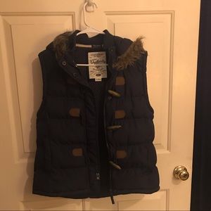 Navy blue vest with faux fur hood